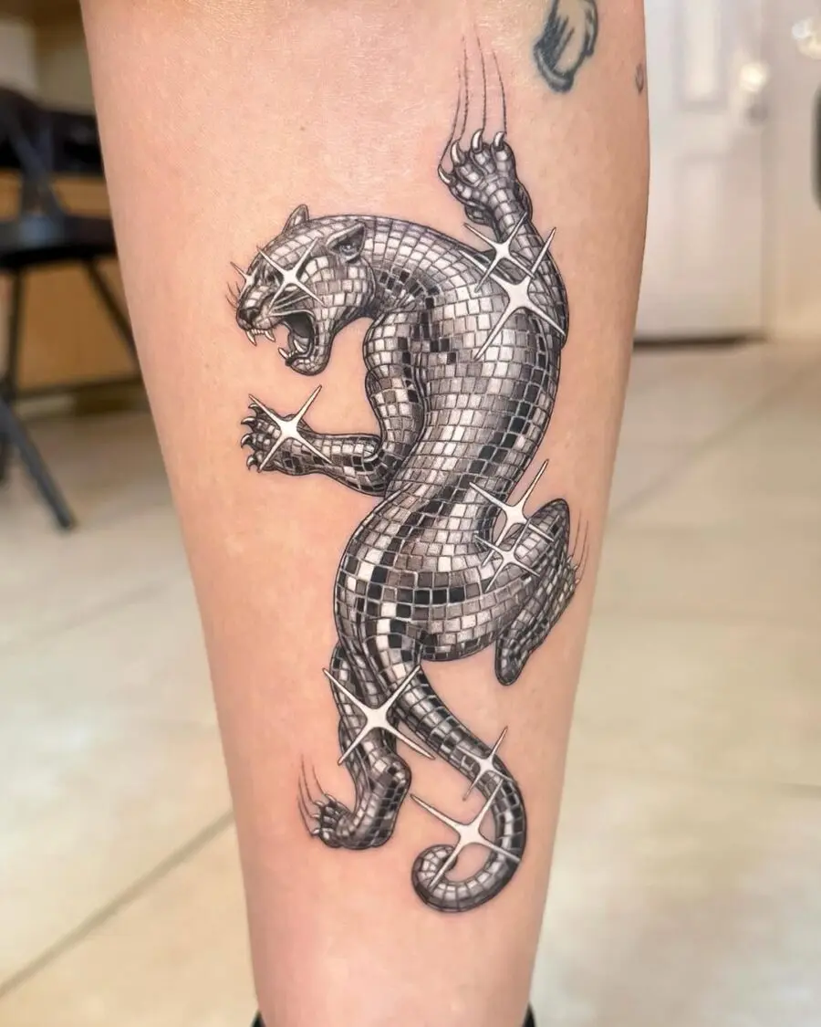 Dynamic silver ink panther tattoo design