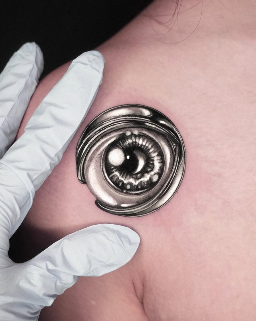 Intricate silver ink eye tattoo design