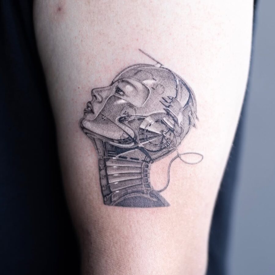 Intricate silver ink robot face design