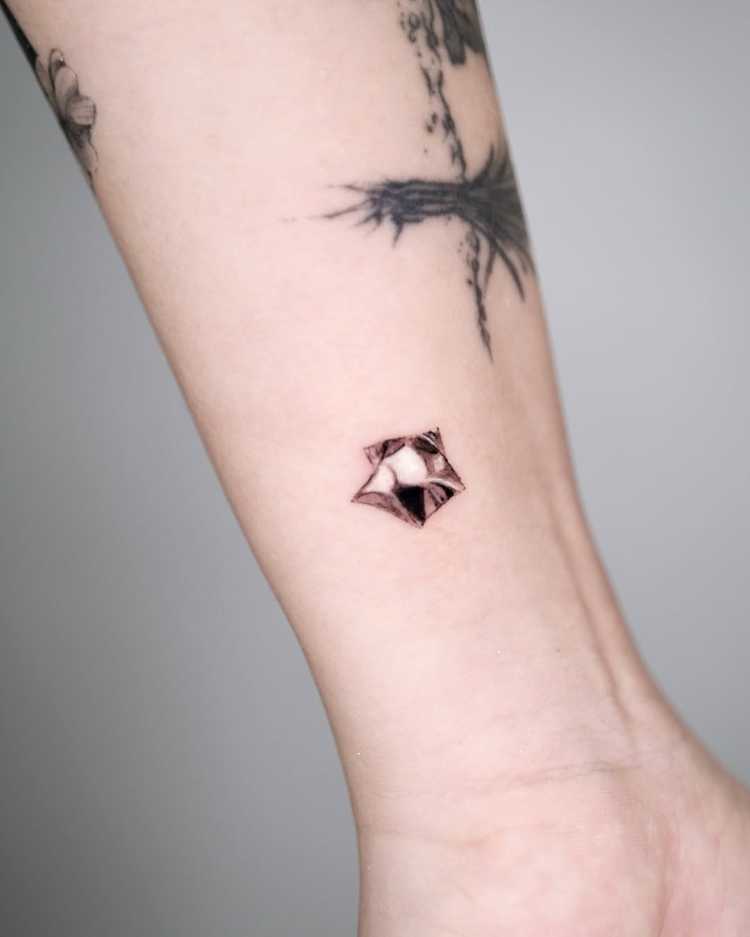 Unique silver ink star tattoo design