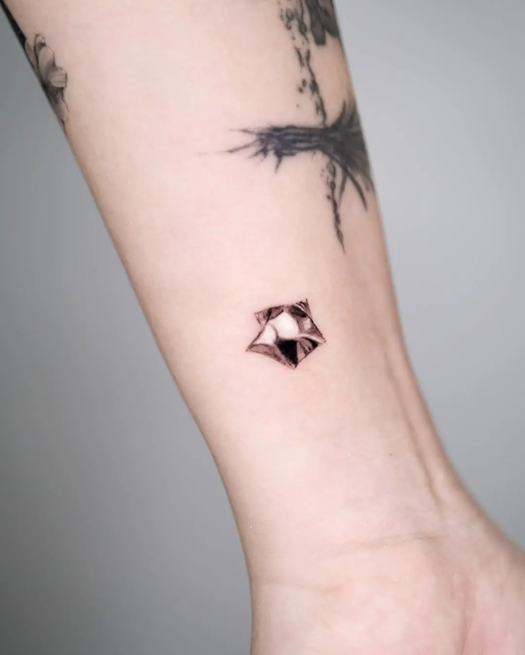 Unique silver ink star tattoo design