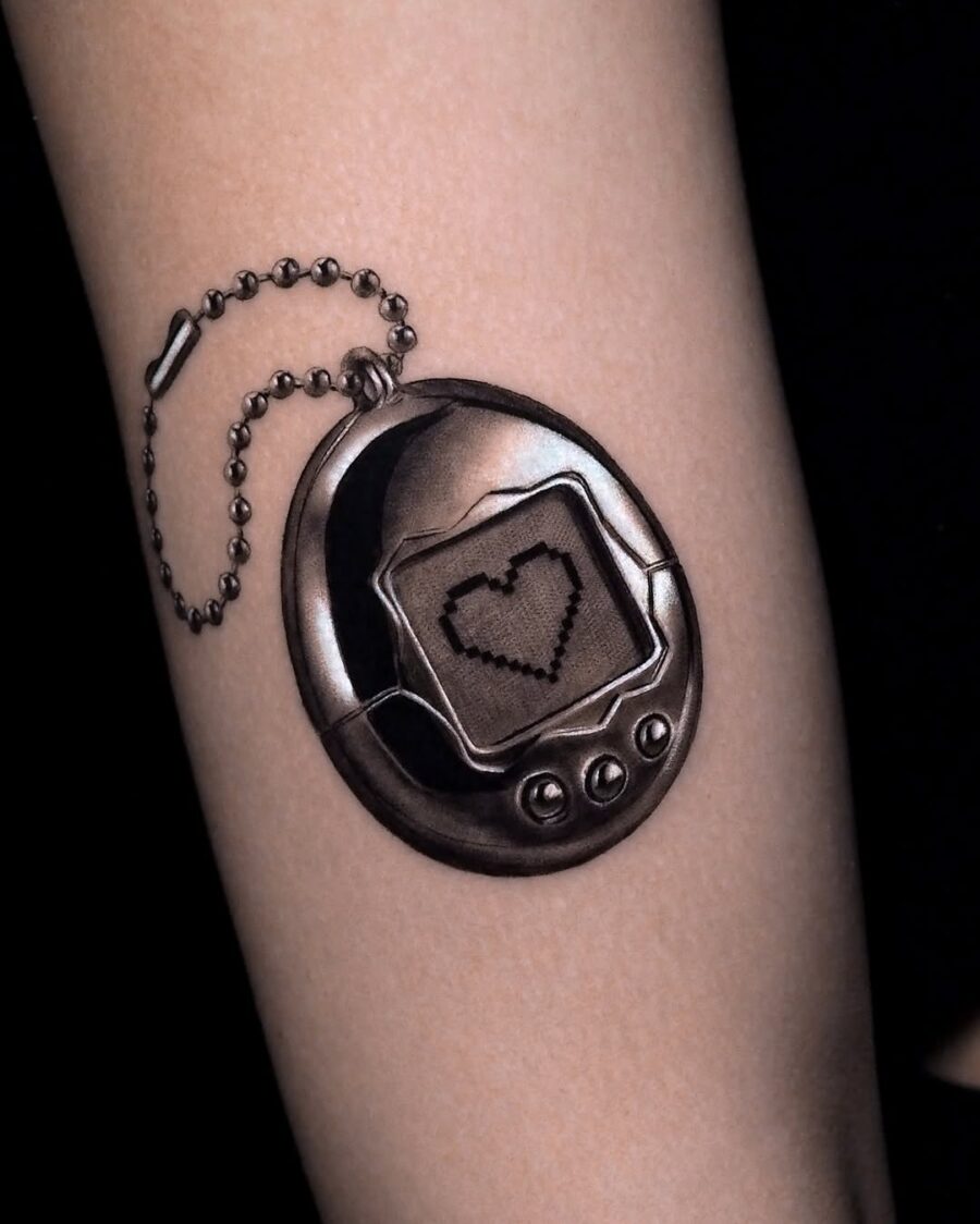 Playful nostalgia captured in silver ink tattoo