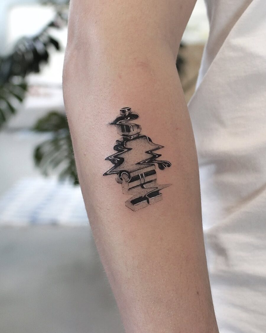 Elegant silver ink tree tattoo with fluid style
