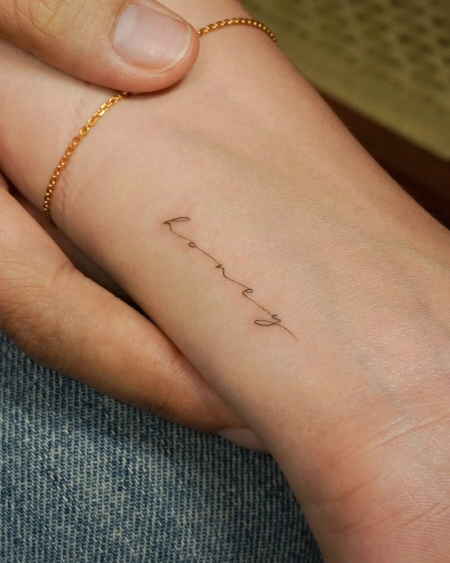 Elegant and Minimalist Handwriting Tattoo