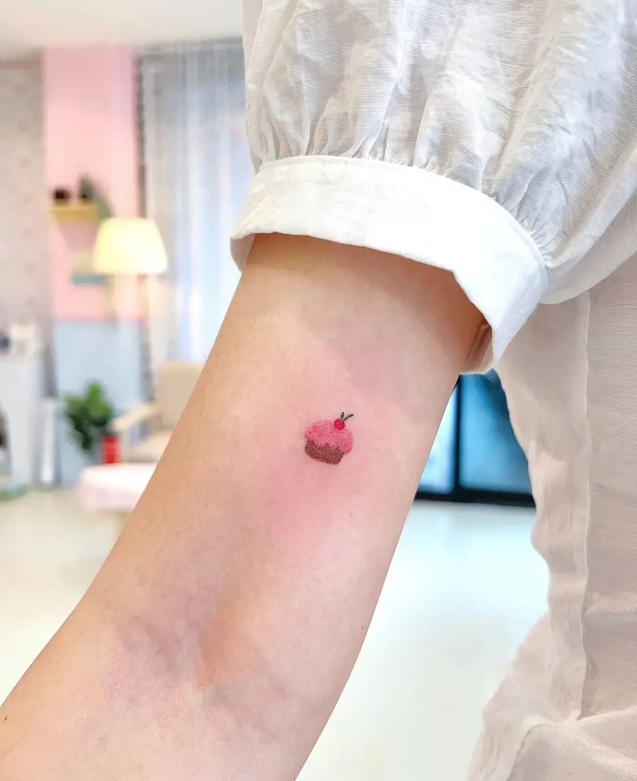 Charming Delicate Cupcake Tattoo Design