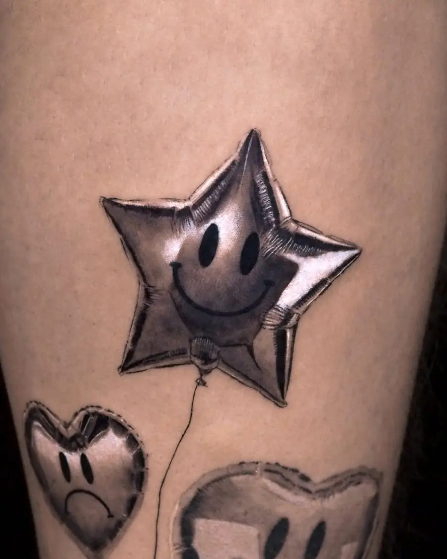 Whimsical Smiley Balloon Star Tattoo Design
