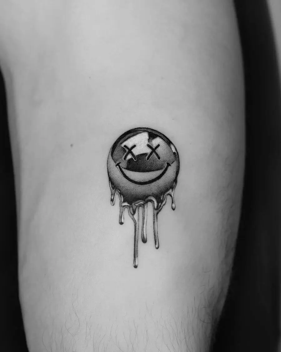 Bold and Melancholic Smiley Face Tattoo Design
