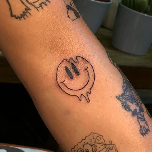 Minimalist Droplet Smiley Face Tattoo Design