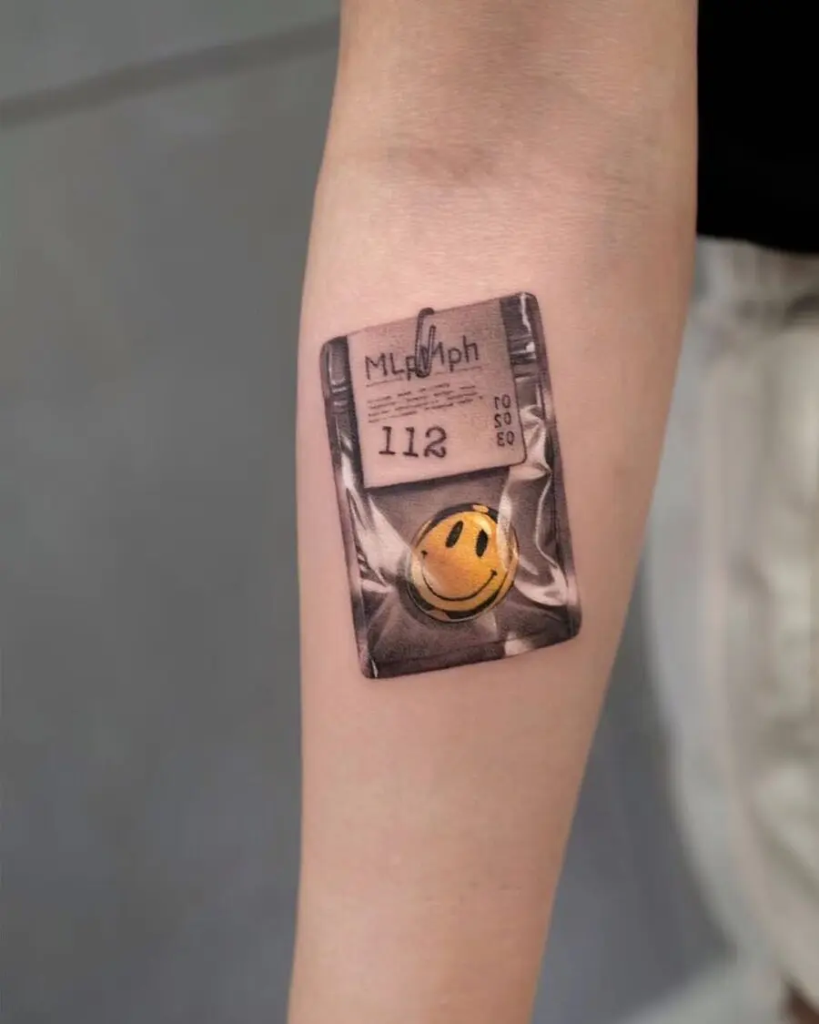 Playful twist on classic smiley face tattoos