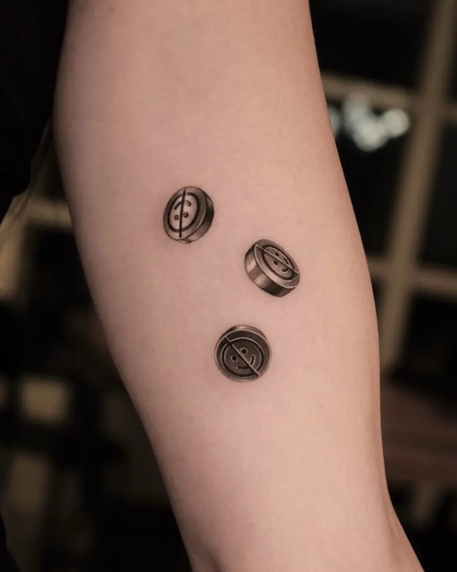 Unique Smiley Face Button Tattoo Designs