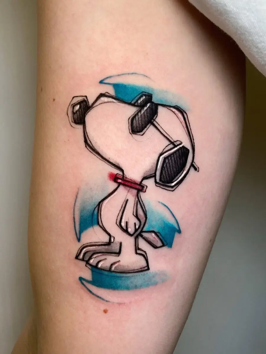 Playful Snoopy Tattoo with Vibrant Colors