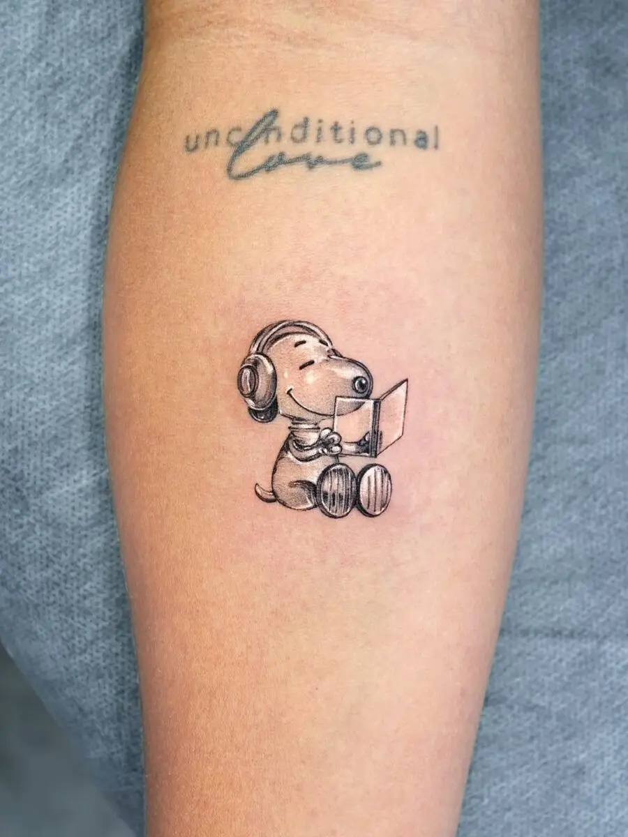 Playful Snoopy in Silver Ink Tattoo Style