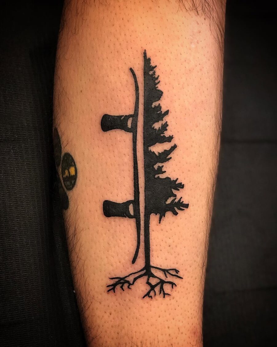 Unique snowboard tattoo combining nature and sport