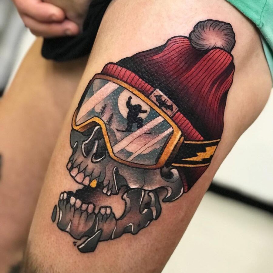 Unique skull tattoo with snowboarder vibes