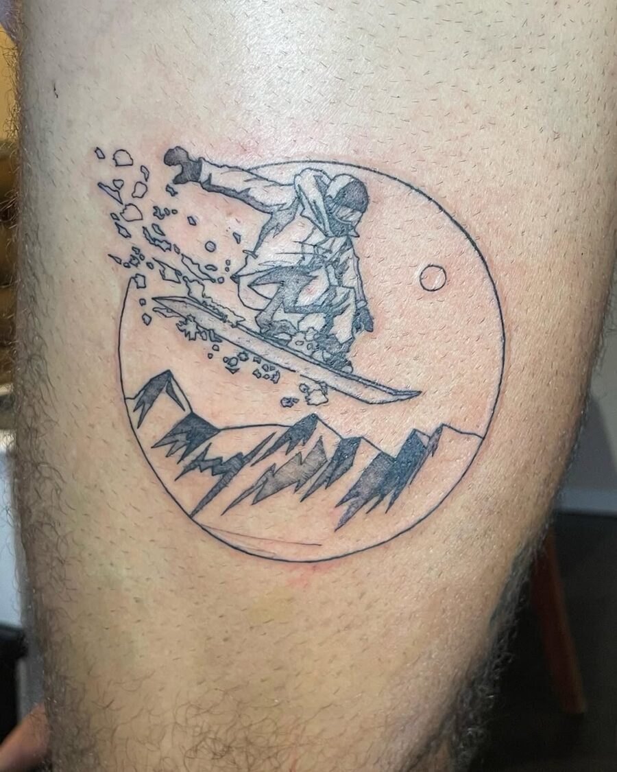 Dynamic Snowboarder Riding Through Mountains