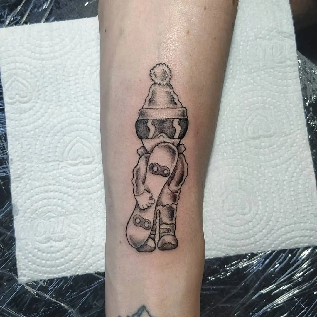 Playful snowboarder tattoo for snow lovers