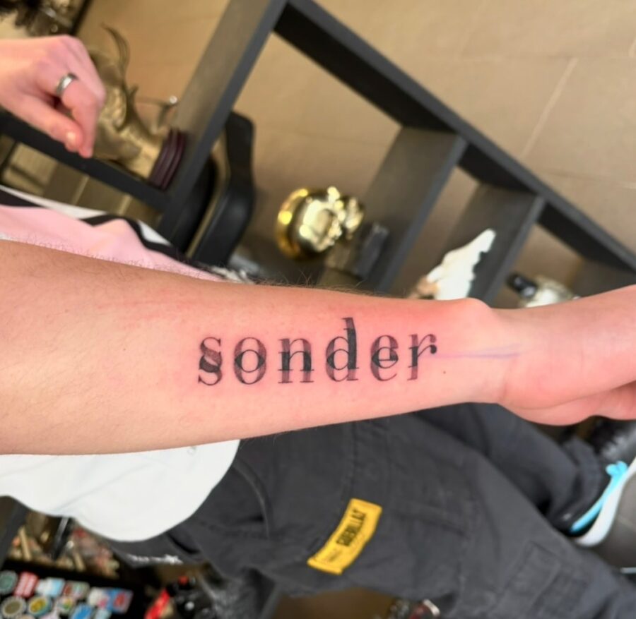 Stylish Minimalist Font Tattoo on Forearm