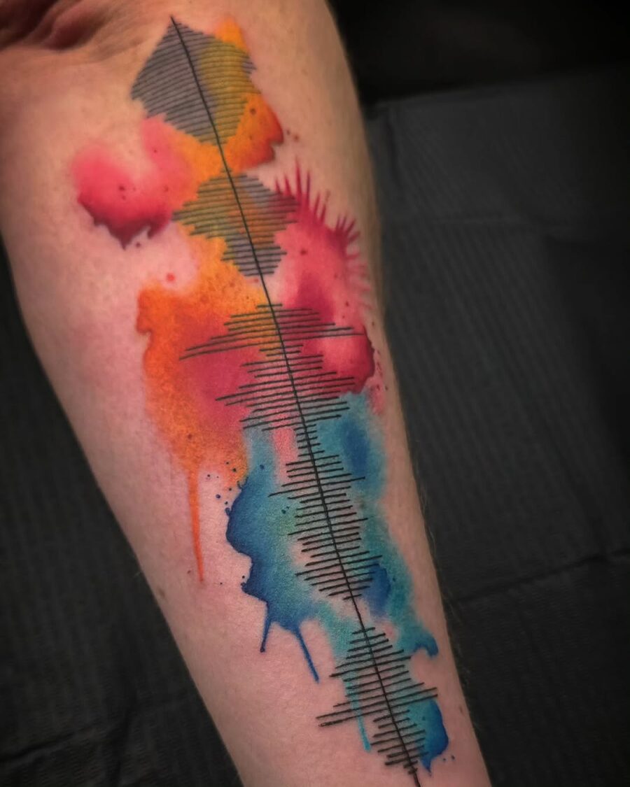 Vibrant Soundwave Tattoo with Watercolor Elements
