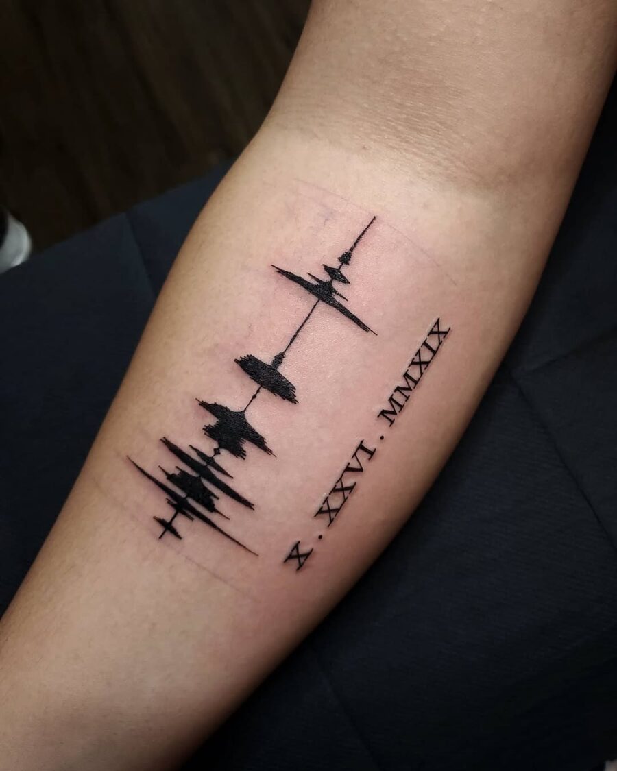 Stylish soundwave tattoo with date detail