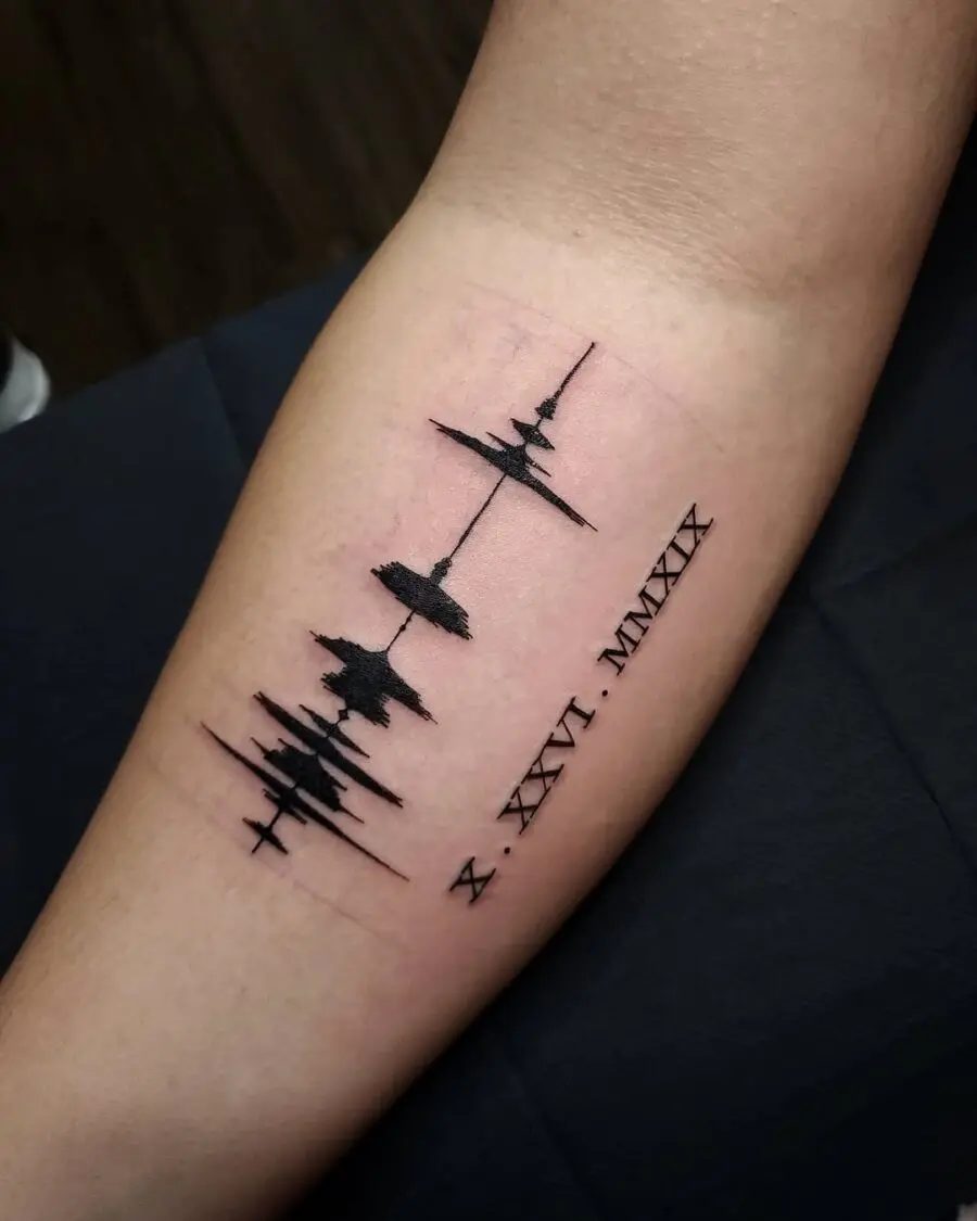Stylish soundwave tattoo with date detail
