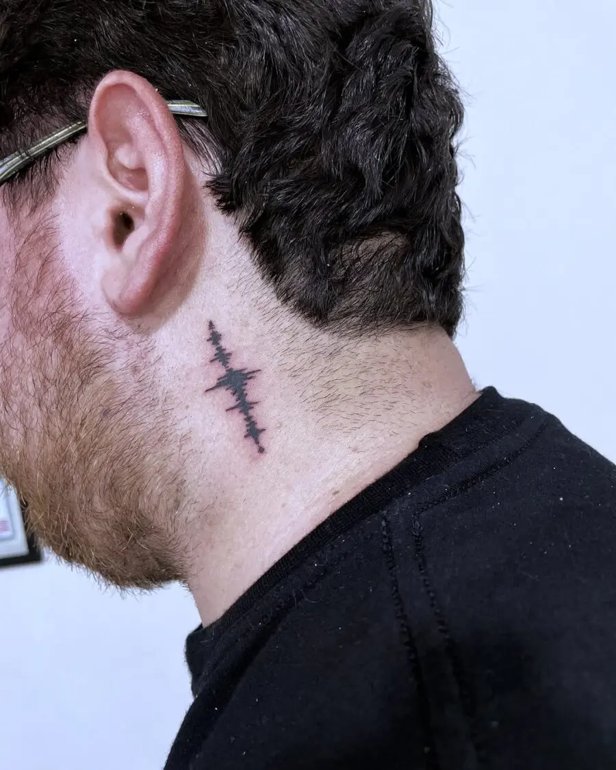Minimalistic soundwave tattoo on the neck