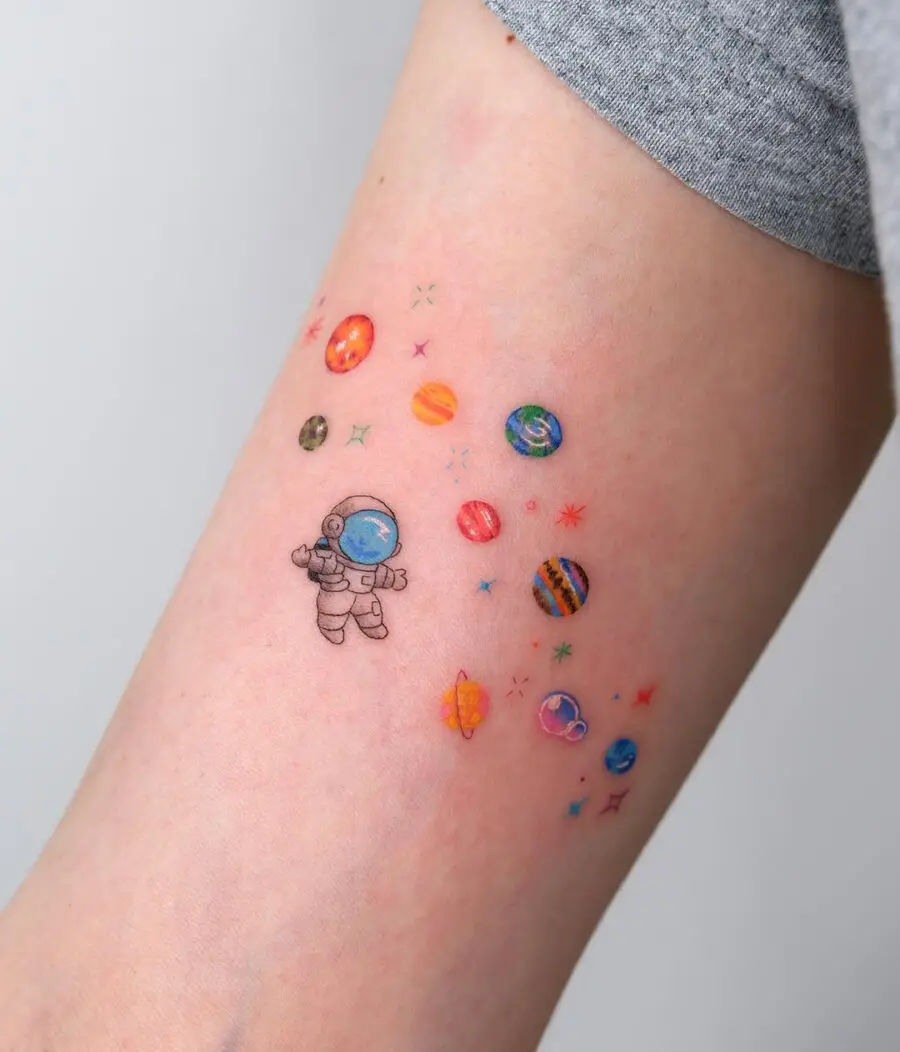 Whimsical Astronaut Among Vibrant Planets