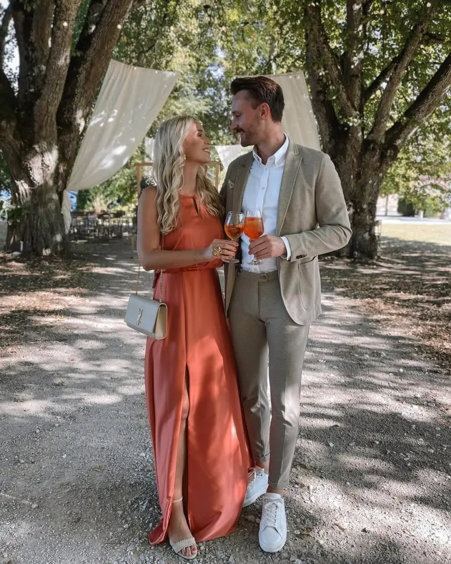 Elegant summer wedding duo in stylish outfits