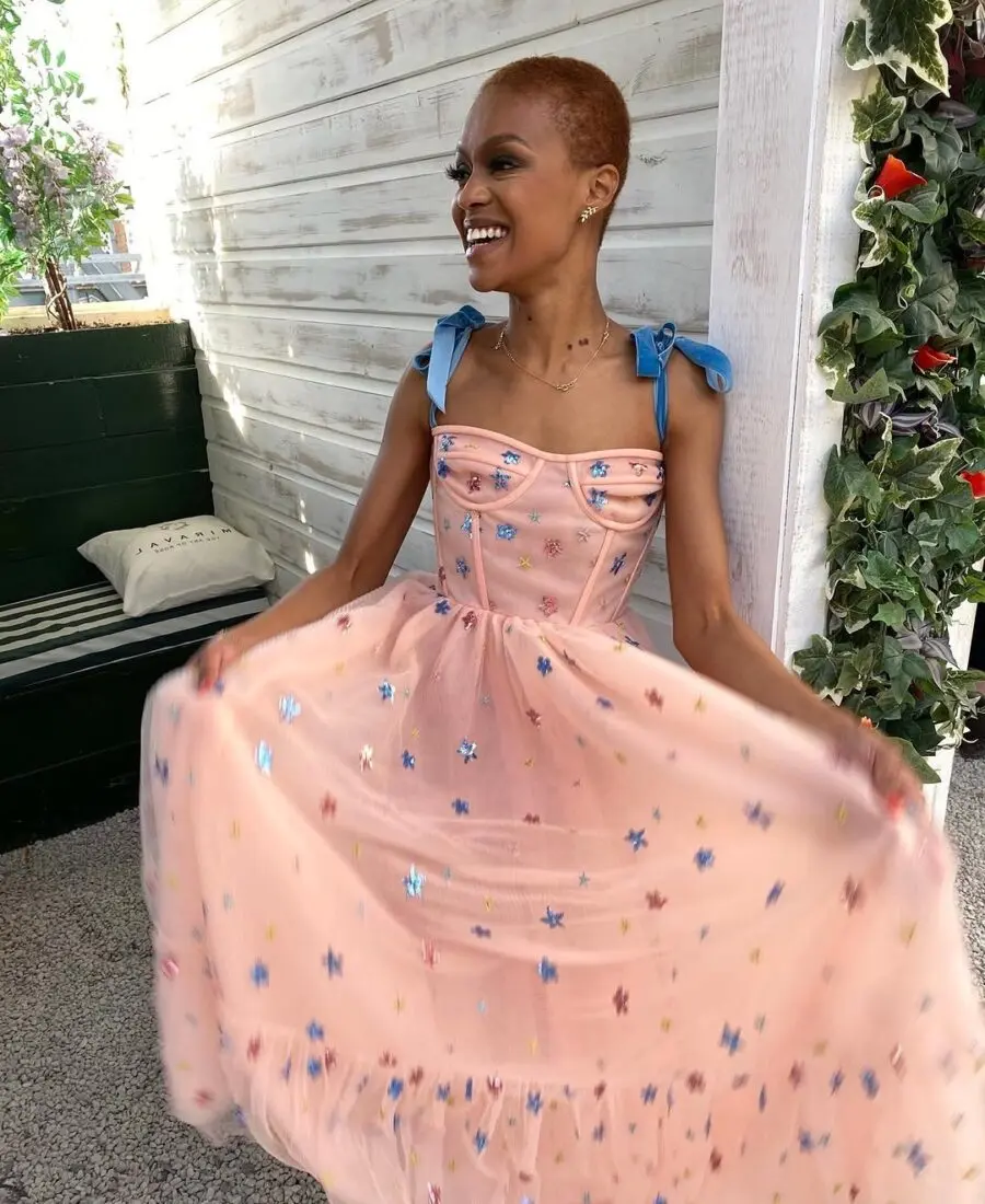Delightful pink dress with playful blue bows