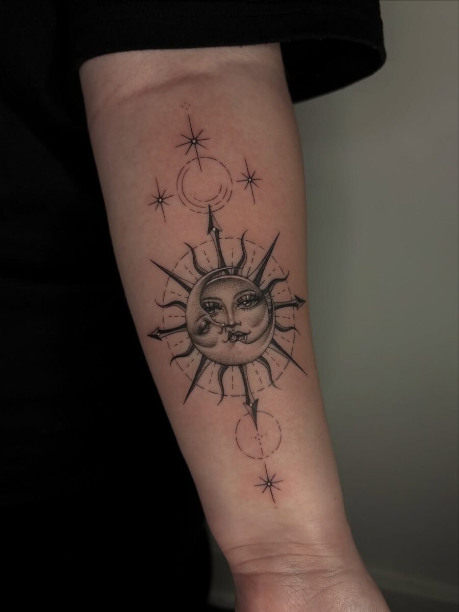 Stunning sun and moon tattoo on forearm