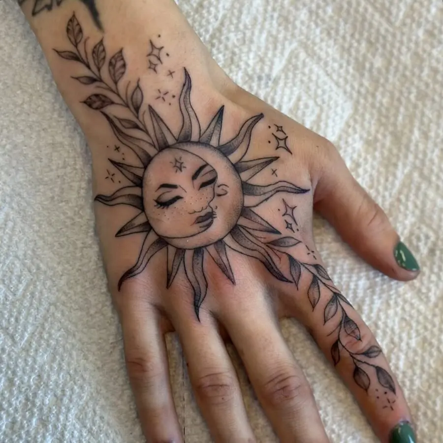 Stunning Sun Tattoo with Floral Elements