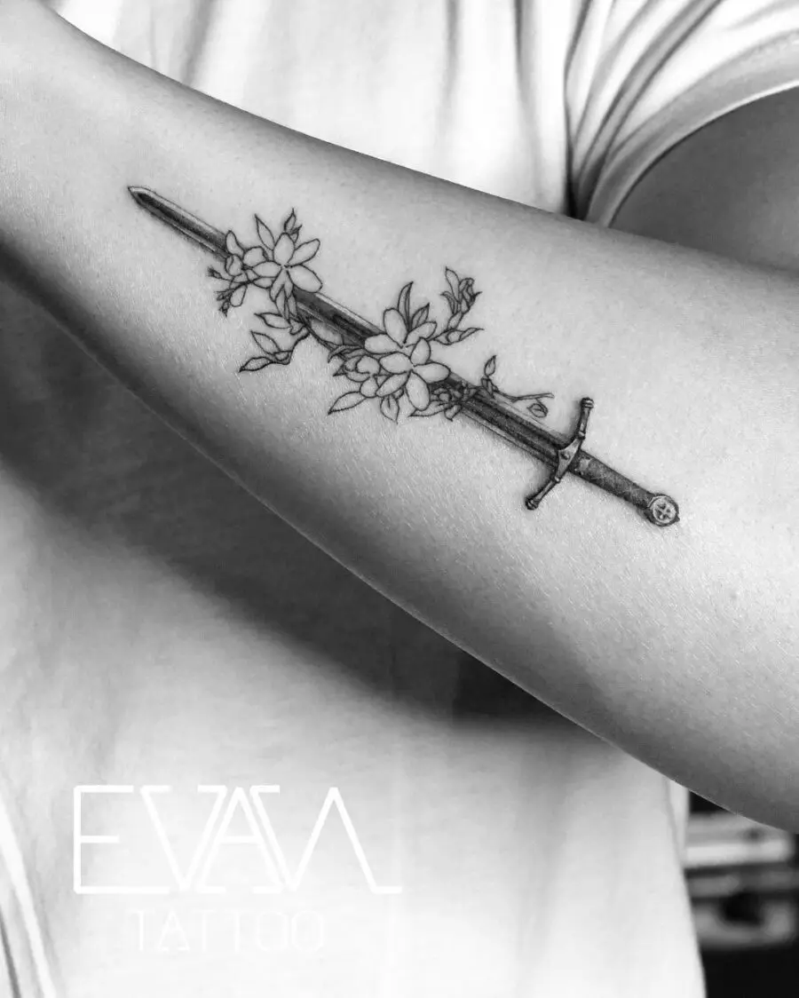 Elegant sword entwined with sampaguita flowers