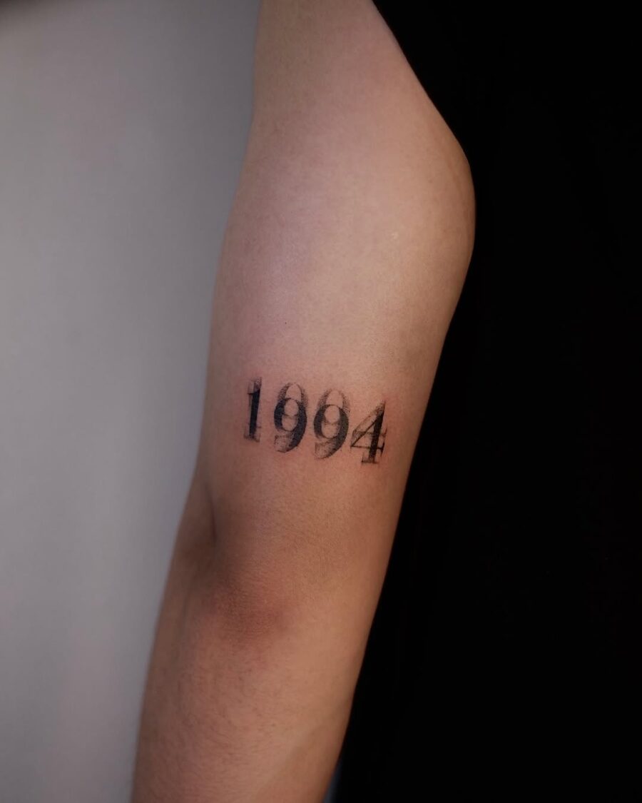 Minimalistic tattoo of the year 1994