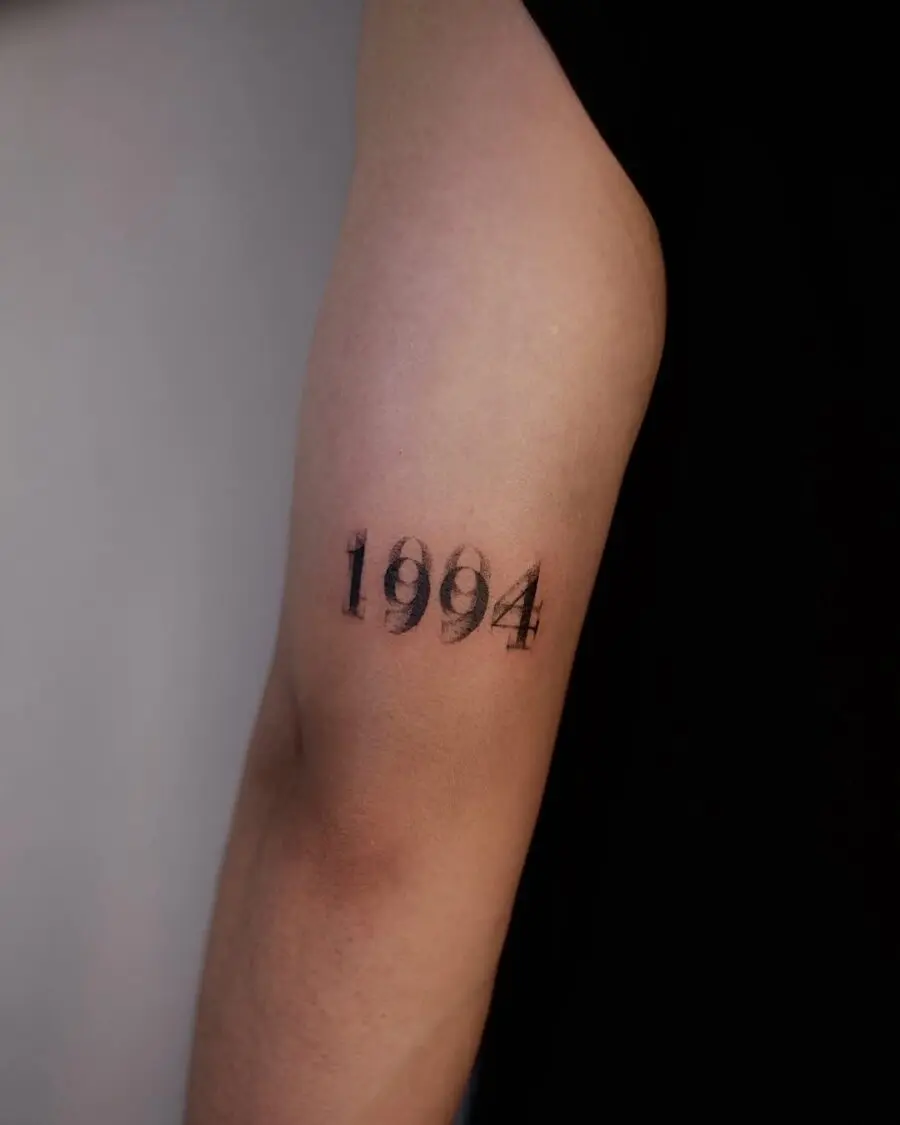 Minimalistic tattoo of the year 1994