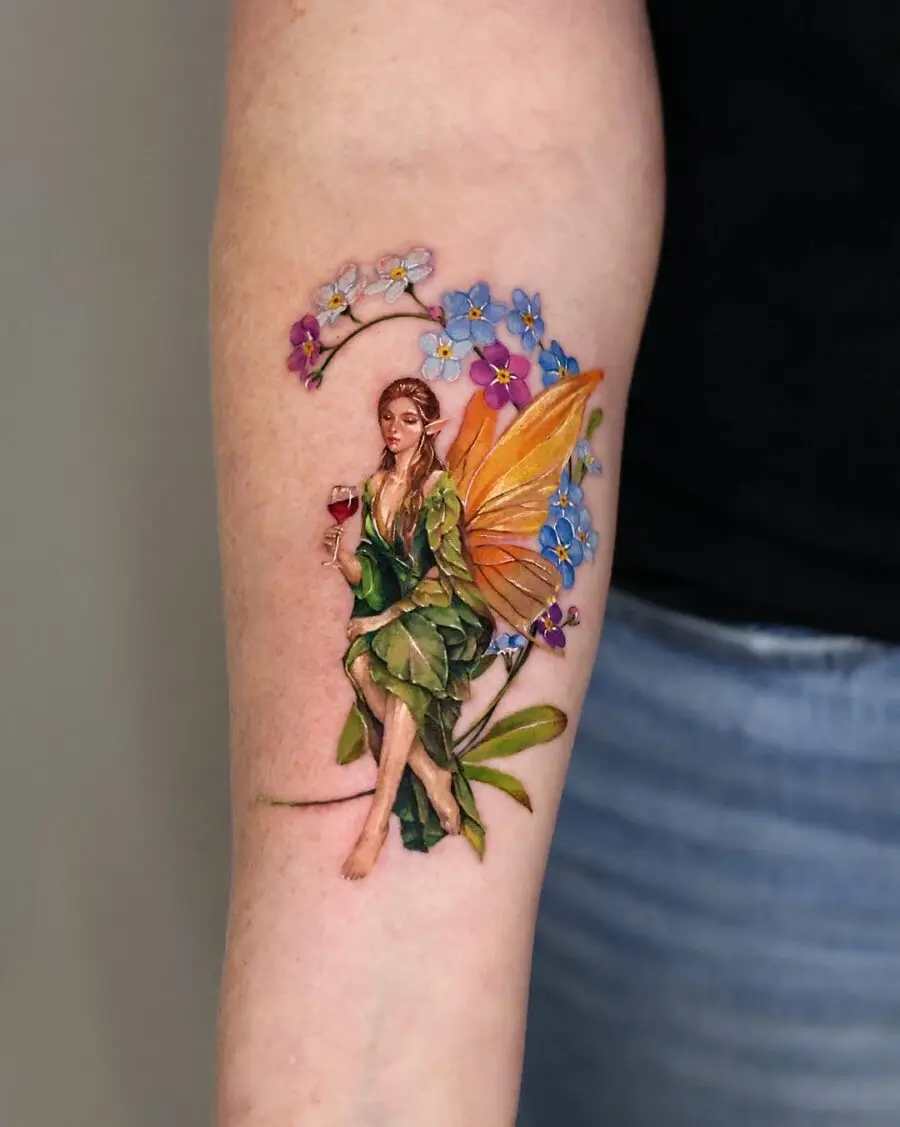 Enchanting fairy tattoo with floral details
