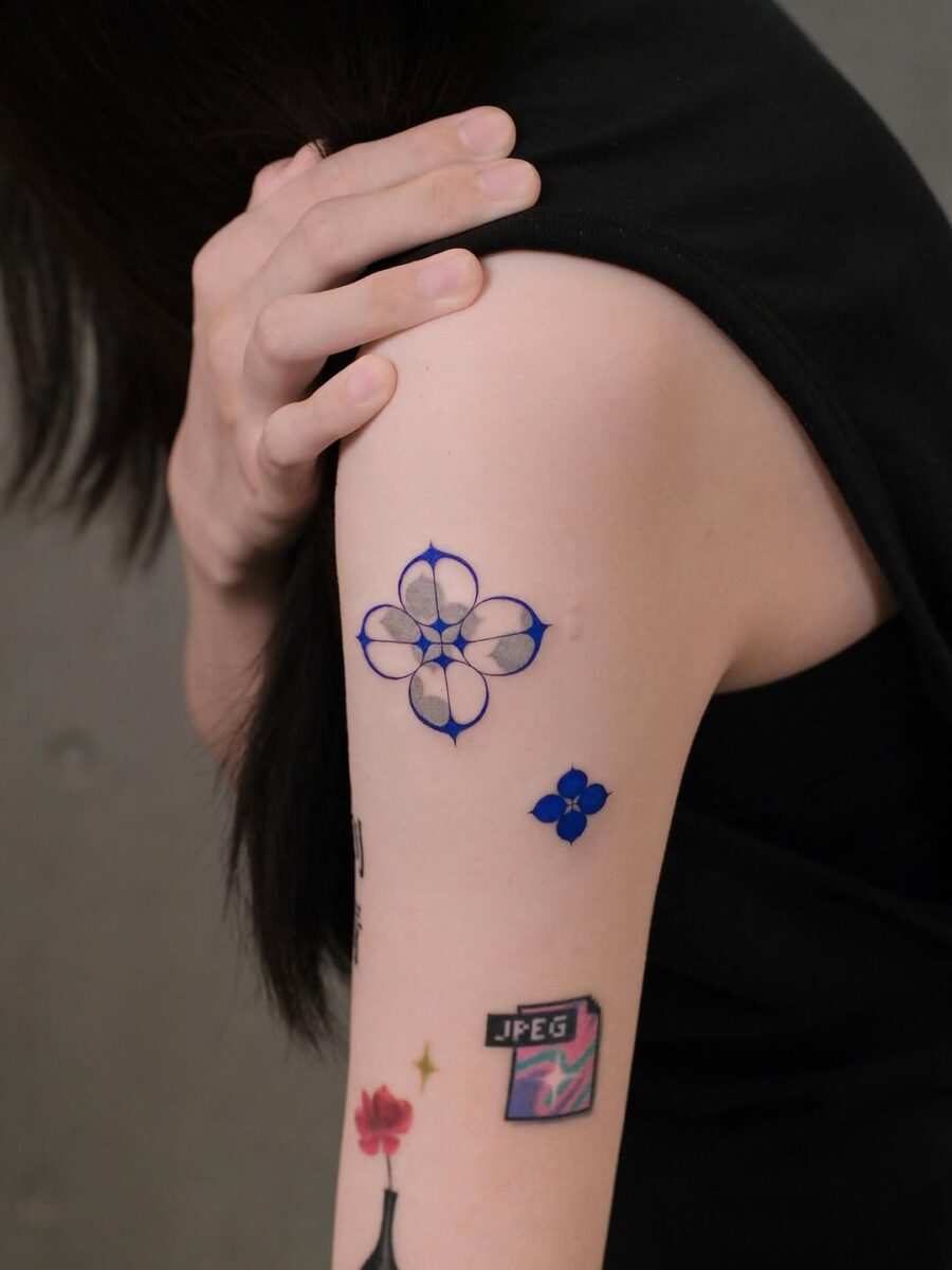 Delicate blue floral aesthetic tattoo designs