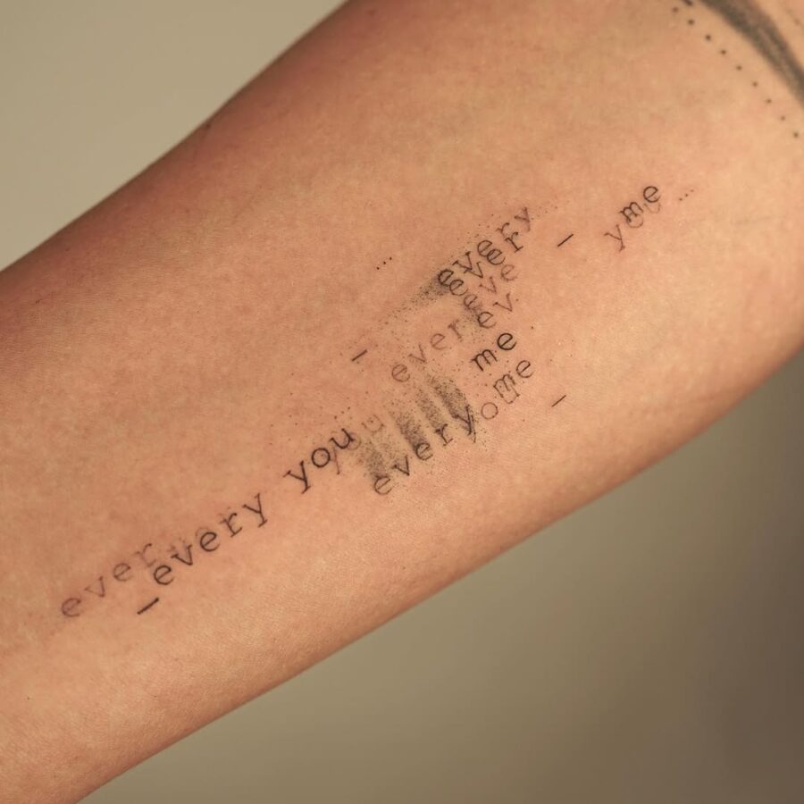 Artistic Tattoo Featuring Textual Overlap