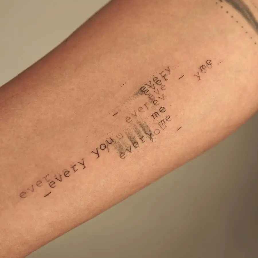 Artistic Tattoo Featuring Textual Overlap
