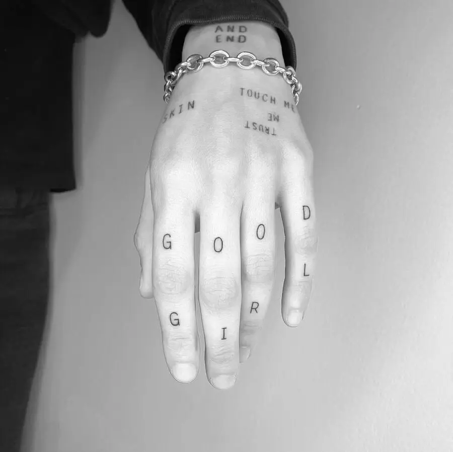 Unique Hand Tattoos with Bold Text