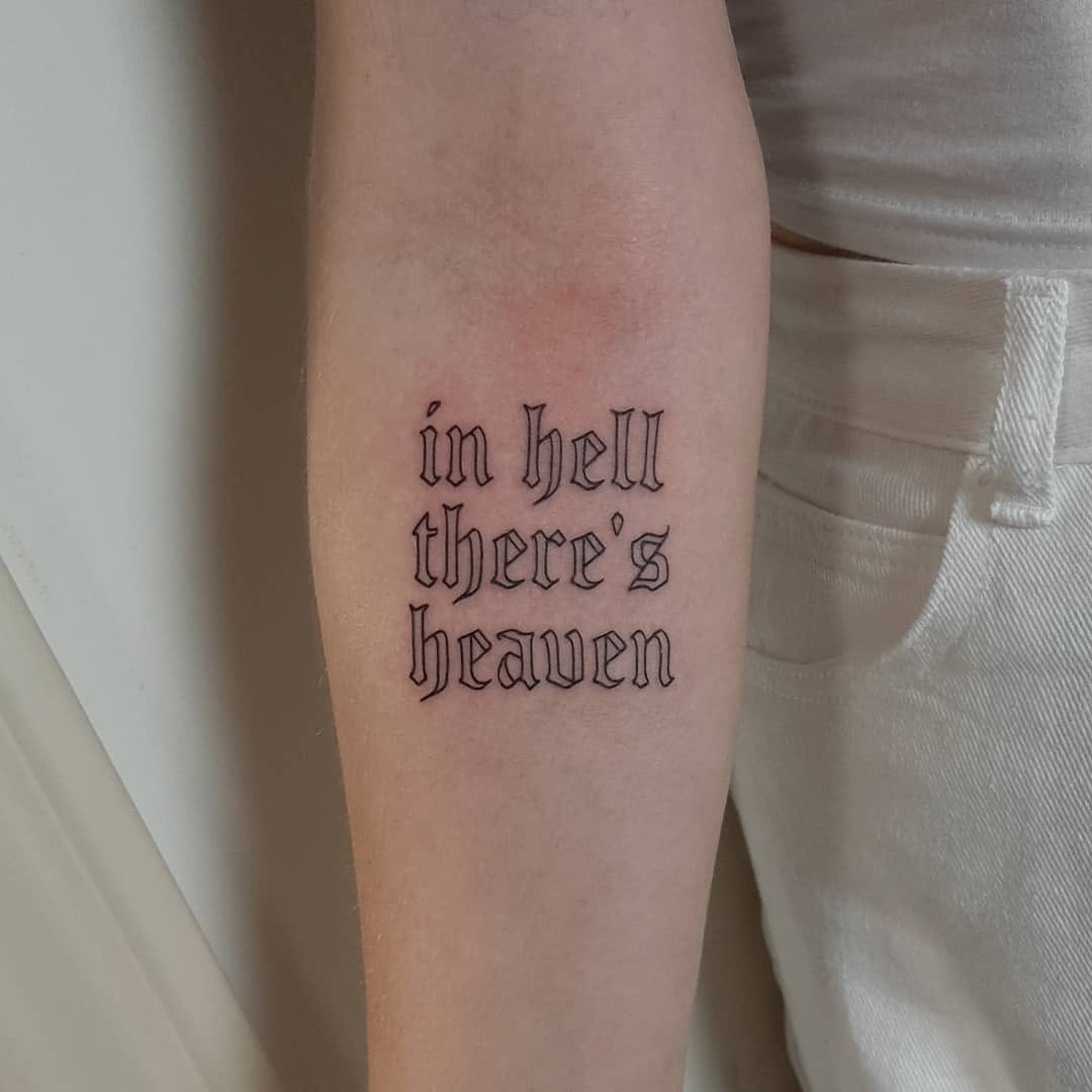 Unique Text Tattoo with Contrasting Themes