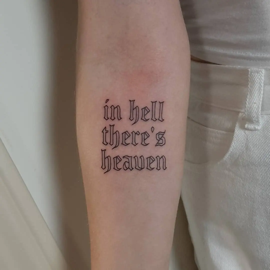 Unique Text Tattoo with Contrasting Themes