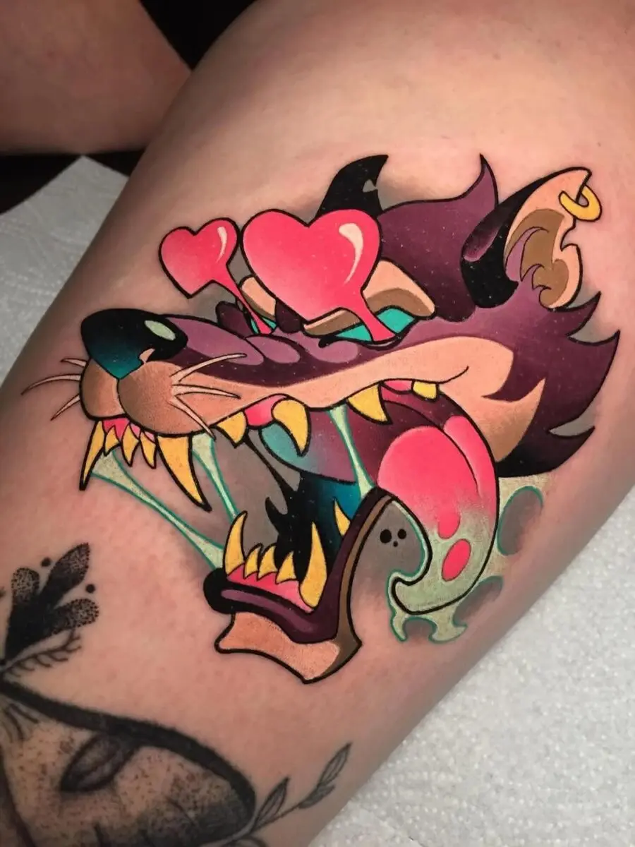 Vibrant wolf tattoo with playful heart accents