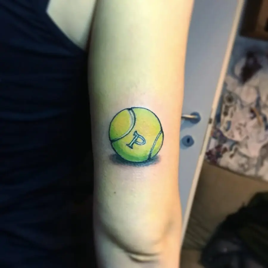 Colorful tennis ball tattoo with letter P