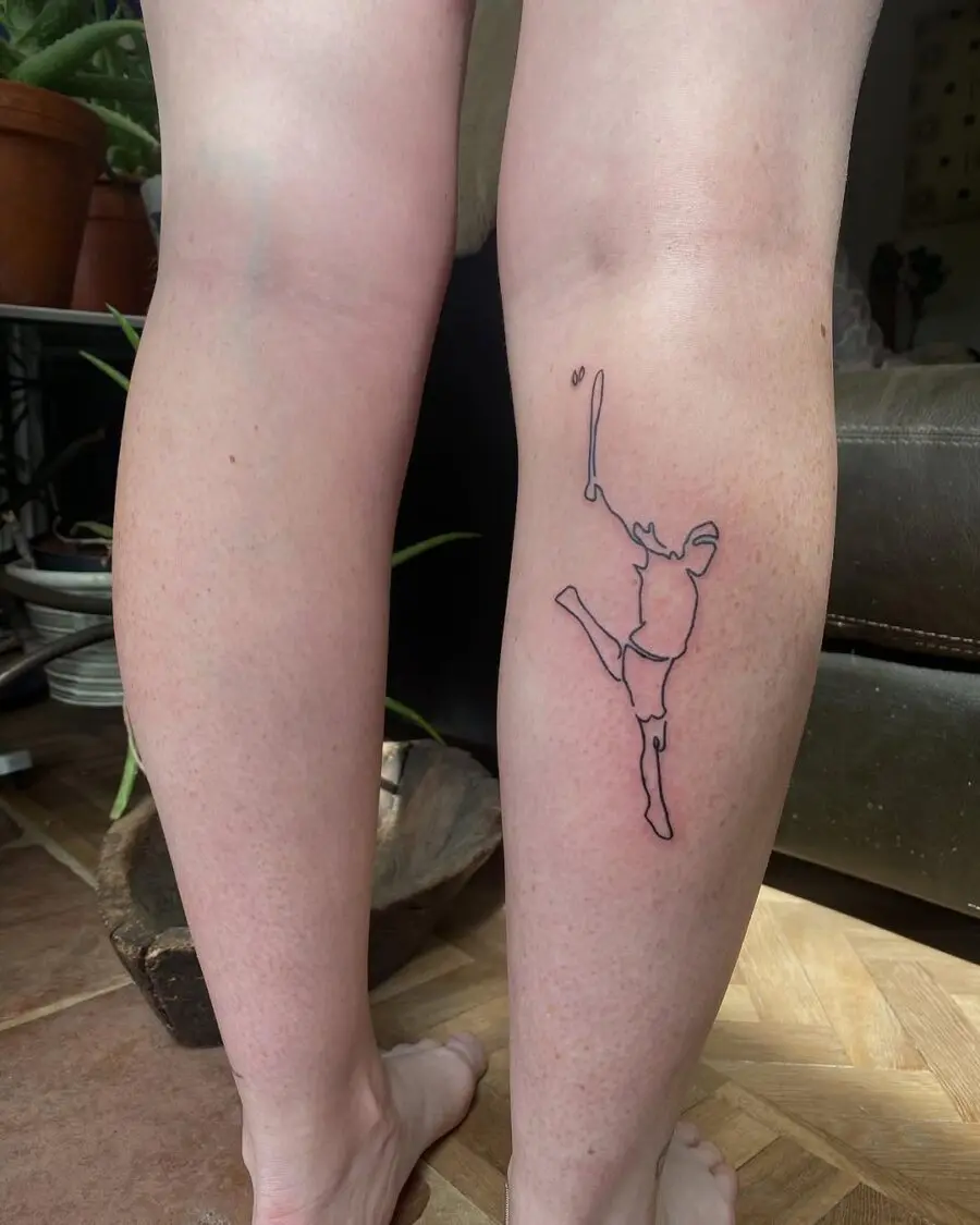 Stylish tennis silhouette tattoo on the leg