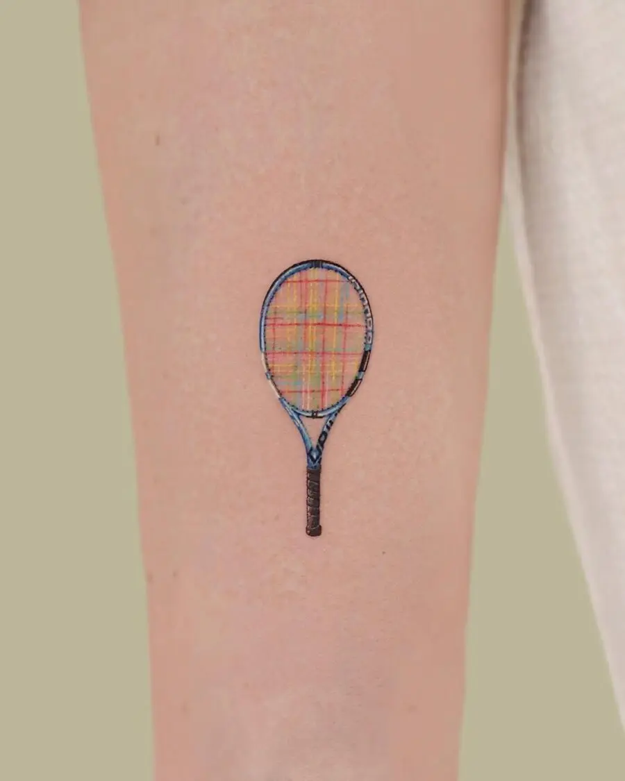 Creative tennis racket tattoo with plaid pattern