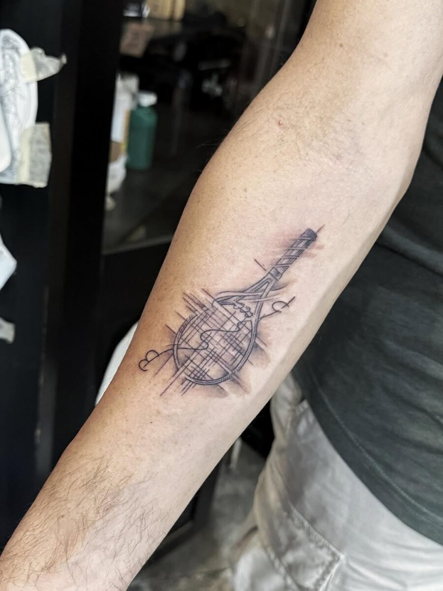 Stylish tennis racket globe tattoo concept