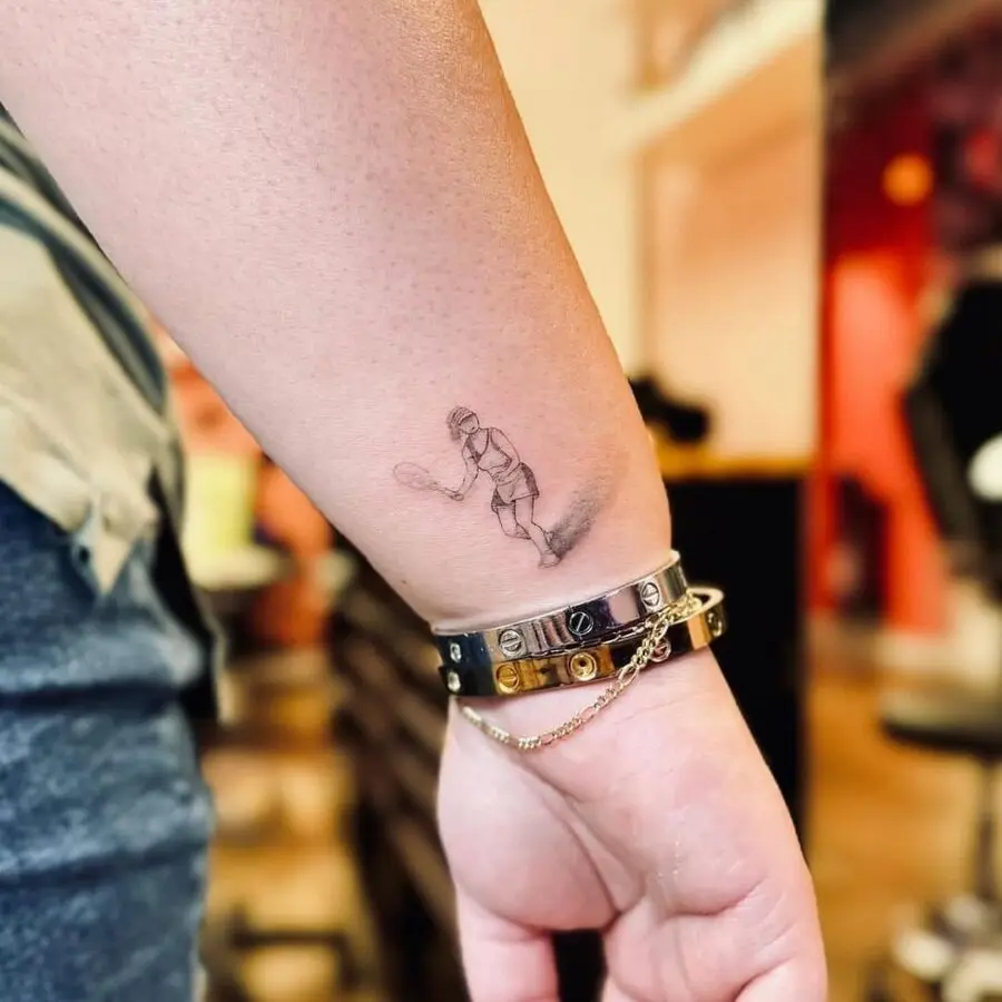 Dynamic tennis player tattoo in action