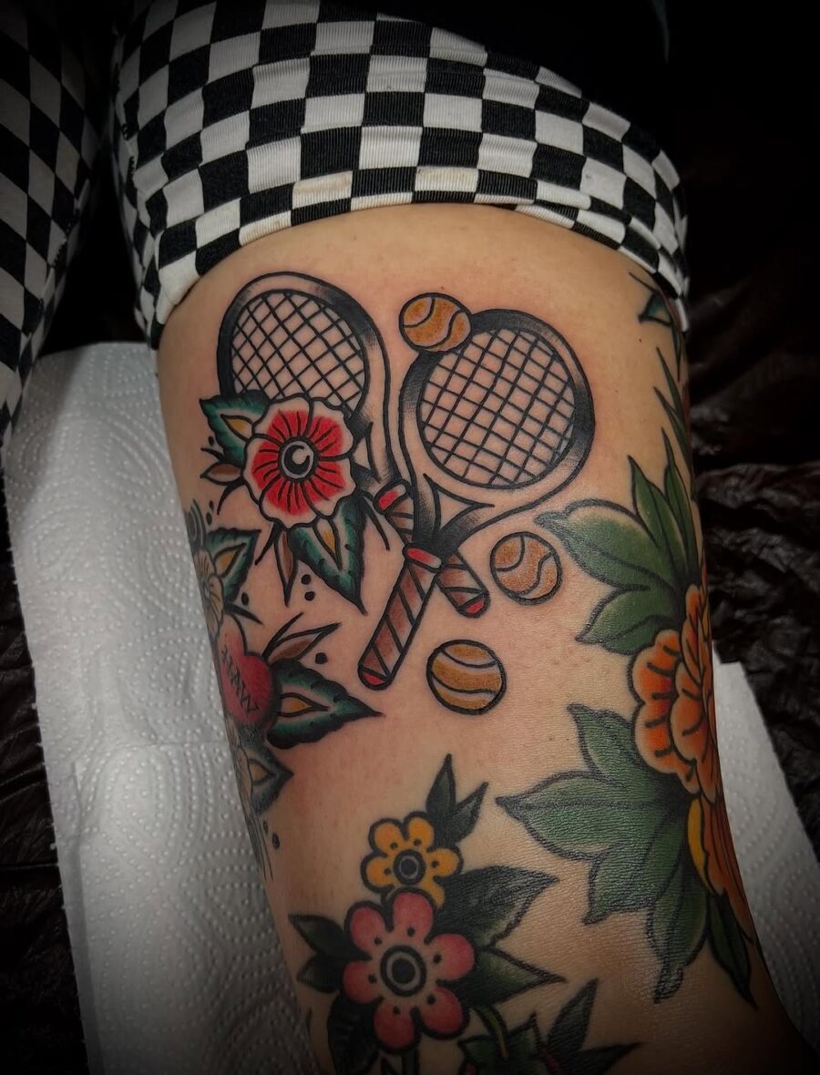 Stylish tennis tattoo merging sport and art