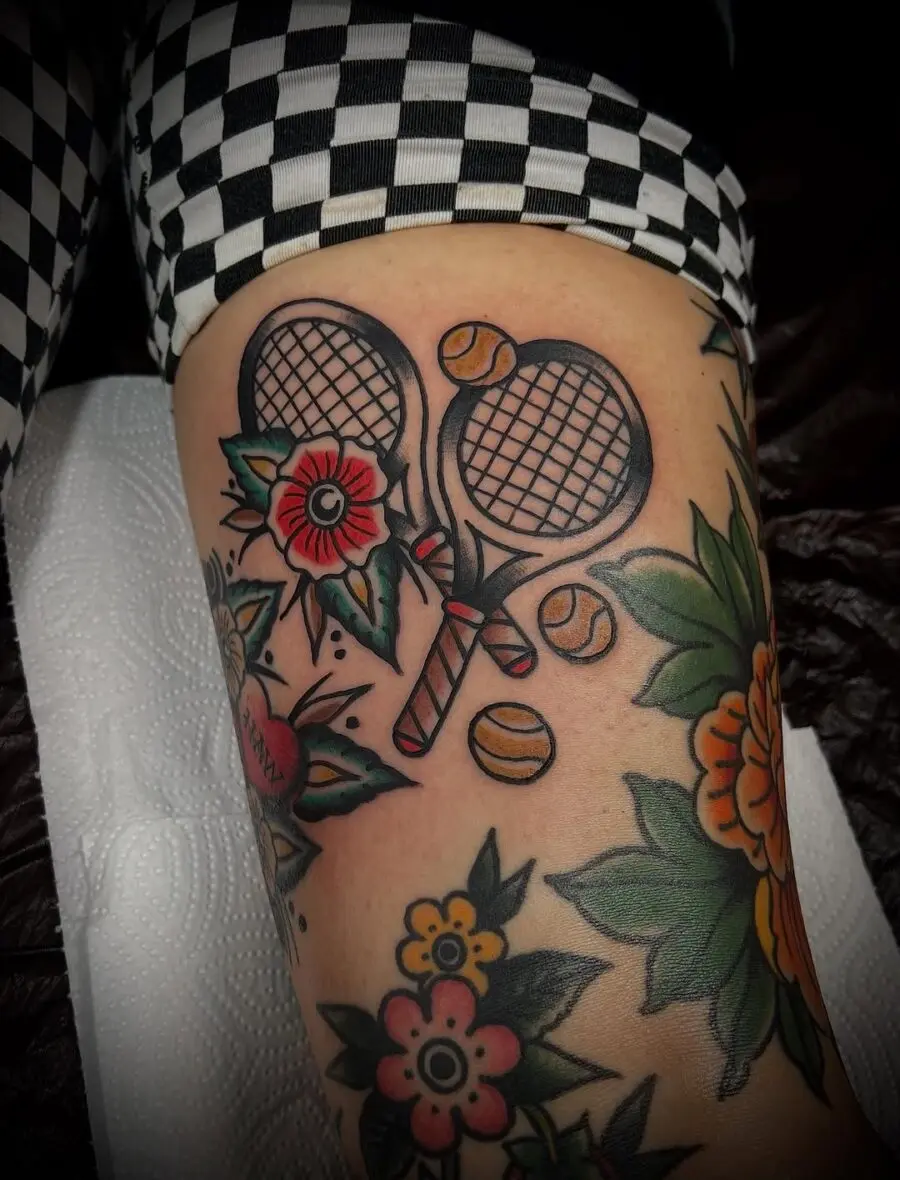 Stylish tennis tattoo merging sport and art