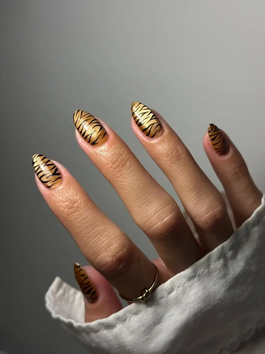 Chic tiger print nails for wild vibes