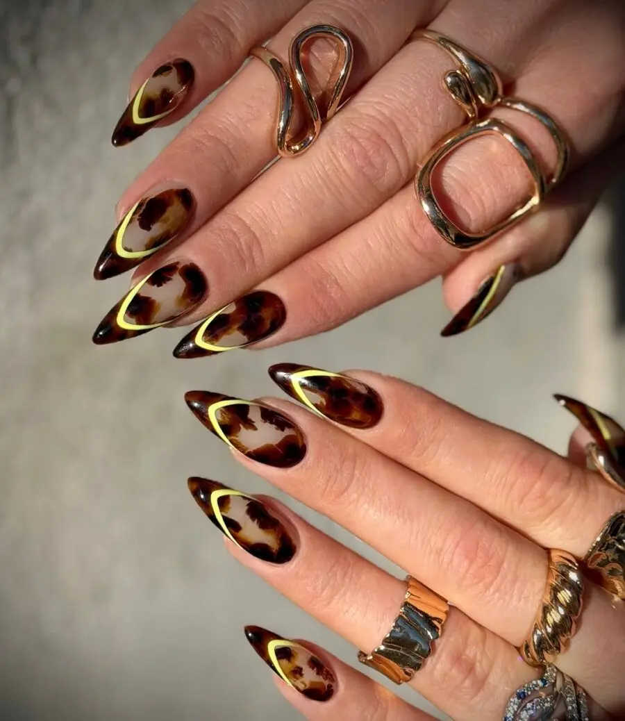 Chic tortoiseshell nails with golden accents